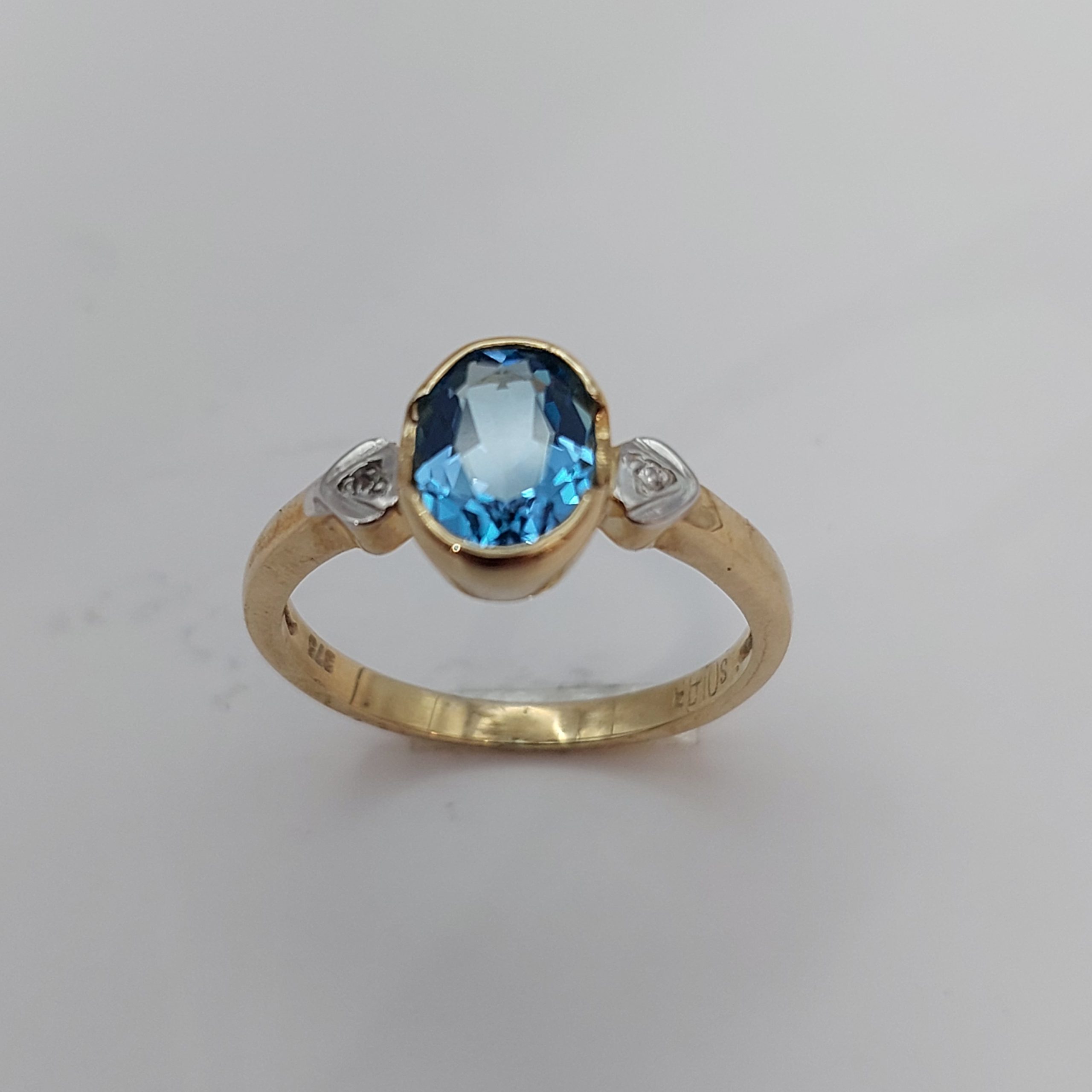 9 carat Yellow Gold Blue Topaz and Diamond Ring 7780