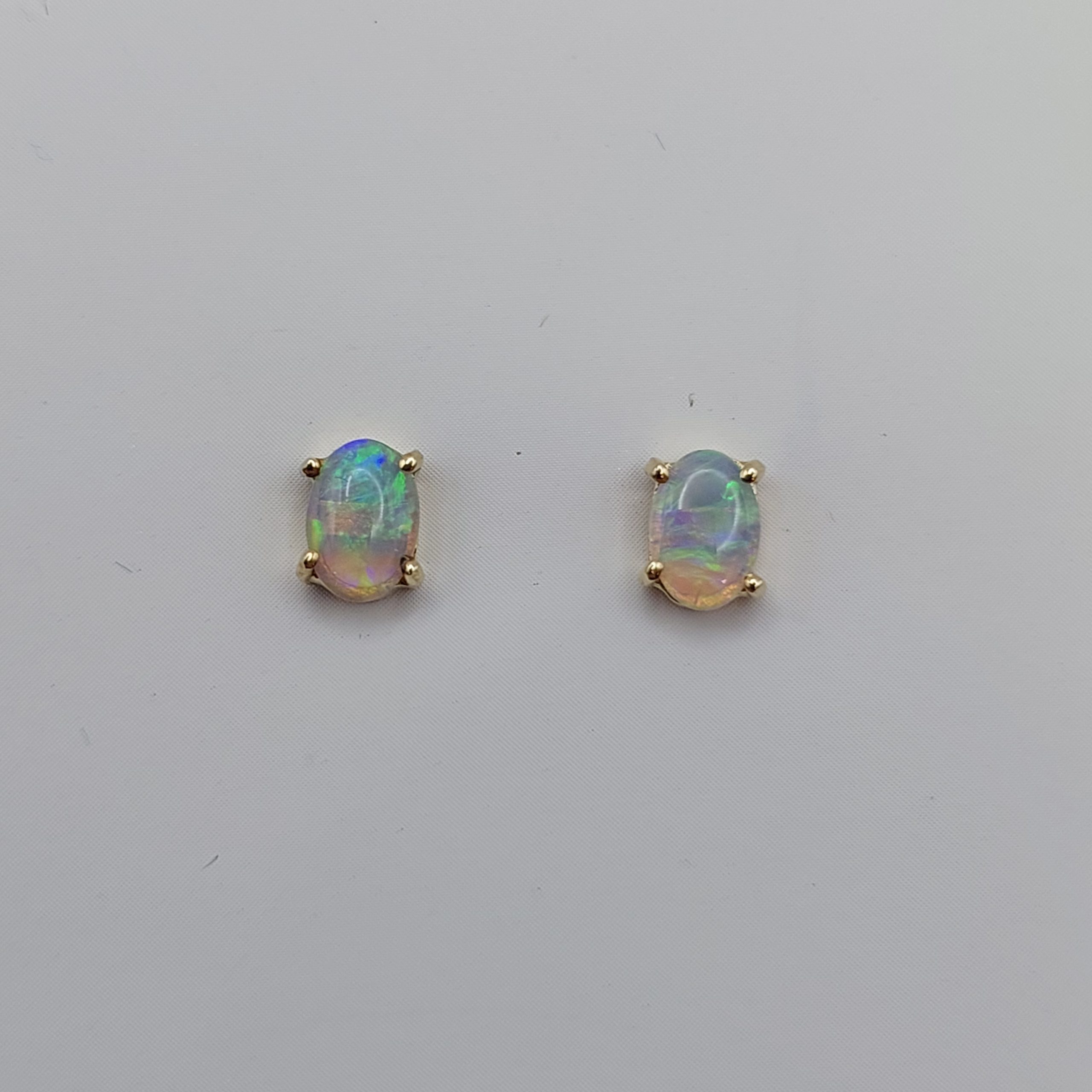 9 Carat Yellow Gold and Opal Stud Earrings E117