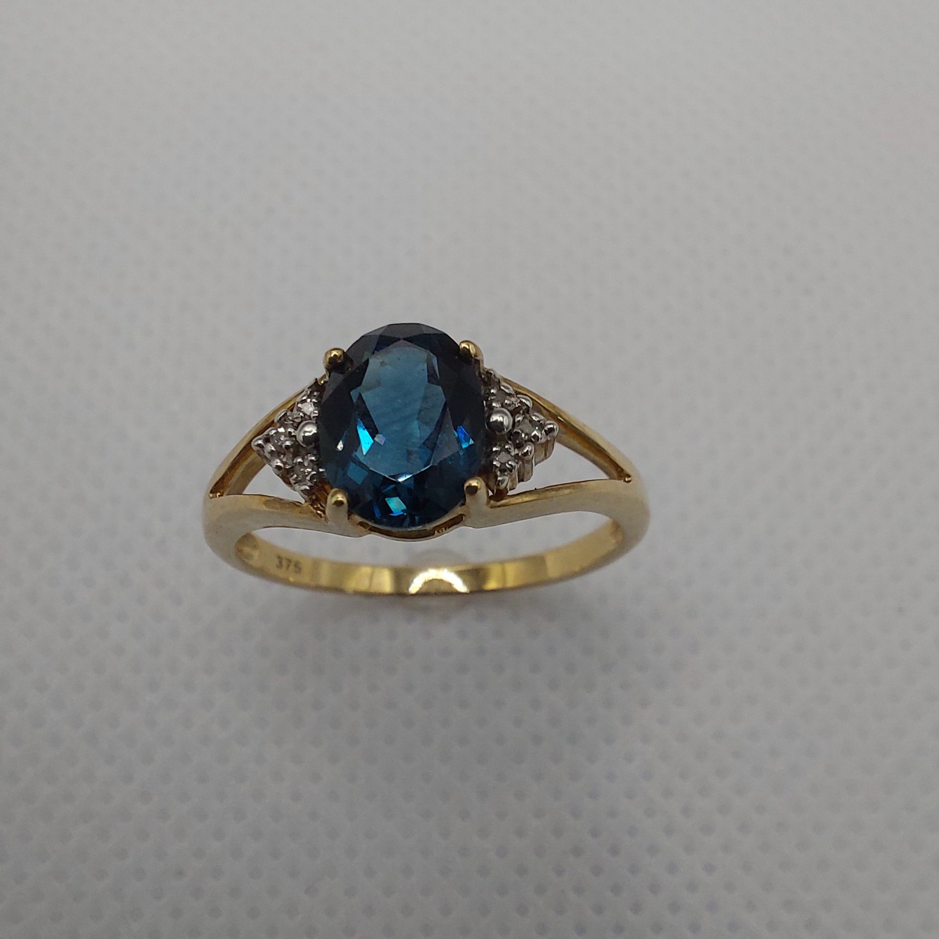 9ct Gold Diamond and London Blue Topaz Ring